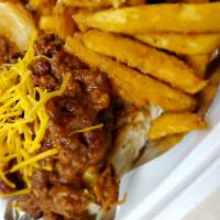 The Chili Cheese Burger · A 8 oz. beef patty grilled to your choice of temperature topped with our house made chili an...