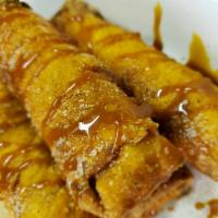 Apple Pie Log · Deep fried and filled with a cinnamon apple filling. Served with a side of caramel sauce.
