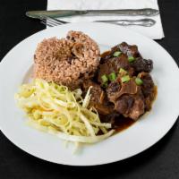 Oxtails · Braised oxtails seasoned with Jamaican spices, herbs and butter beans 