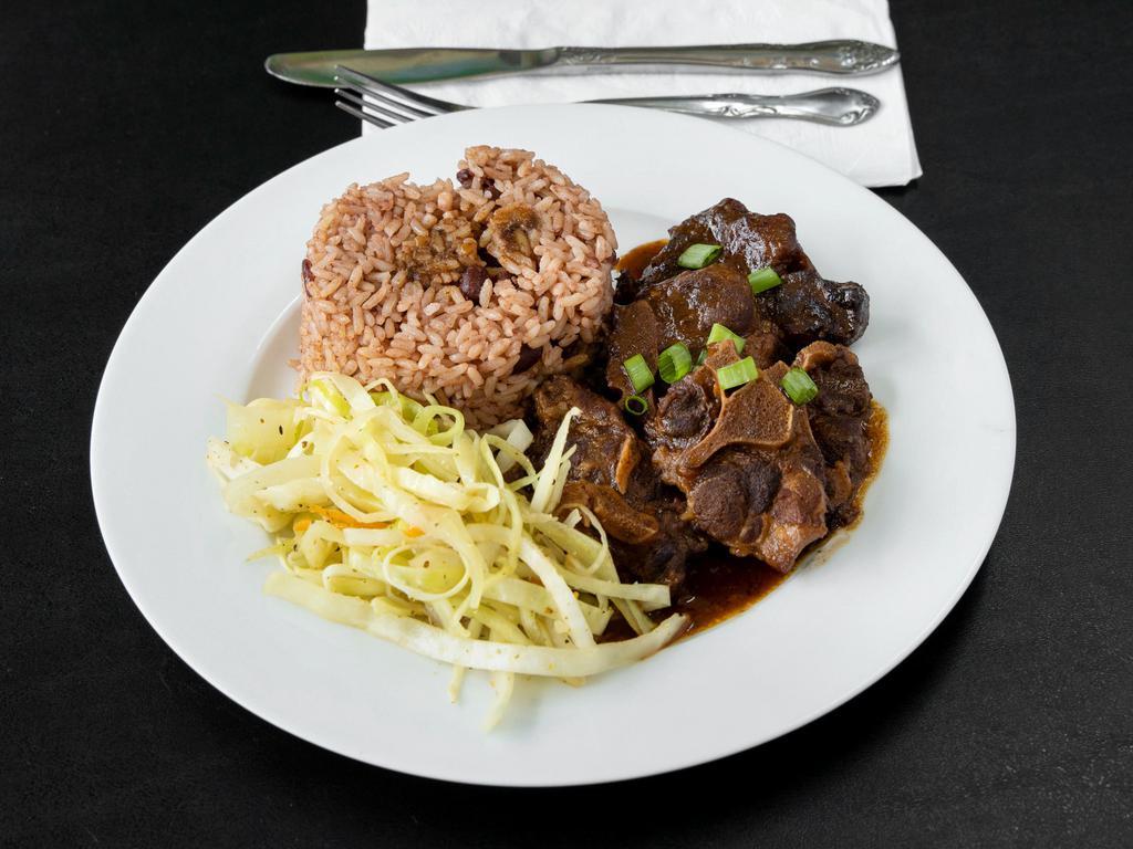 Oxtails · Braised oxtails seasoned with Jamaican spices, herbs and butter beans 