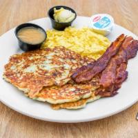 Potato Pancake Platter · 2 eggs prepared your way. Served with choice of bacon or sausage. Includes a side of apple s...