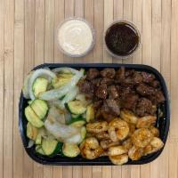 Hibachi Steak and Shrimp  · Tender grilled sirloin steak and shrimp sauteed in our house teriyaki sauce. Includes house ...