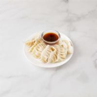Steamed Dumplings · 7 pieces. Stuffed dough and cooked using moist heat.