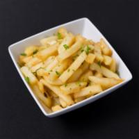 Garlic Fries · Tossed in garlic and parsly infused olive oil 