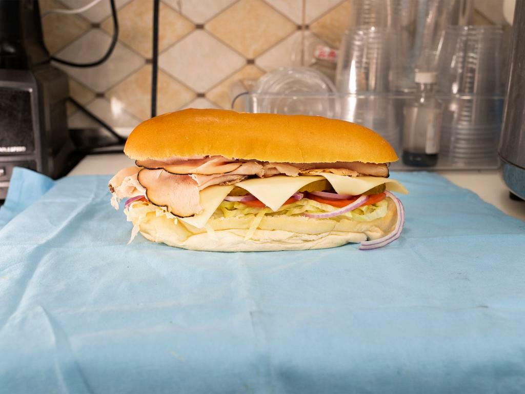 Hero Turkey Sandwich · Includes cheese, lettuce and tomato.
