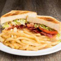 The BLT Sandwich · Texas toast, mayo, lettuce, tomato and bacon.