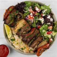 Beef Shish Kabob Plate · Chargroiled cubes of beef served with basmati rice, side salad, fresh pita, and a side of ta...