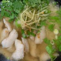 S2. Fillet Striped Bass Rice Soup ข้าวต้มปลา · With Chinese celery, ginger, scallion, cilantro and celery.
