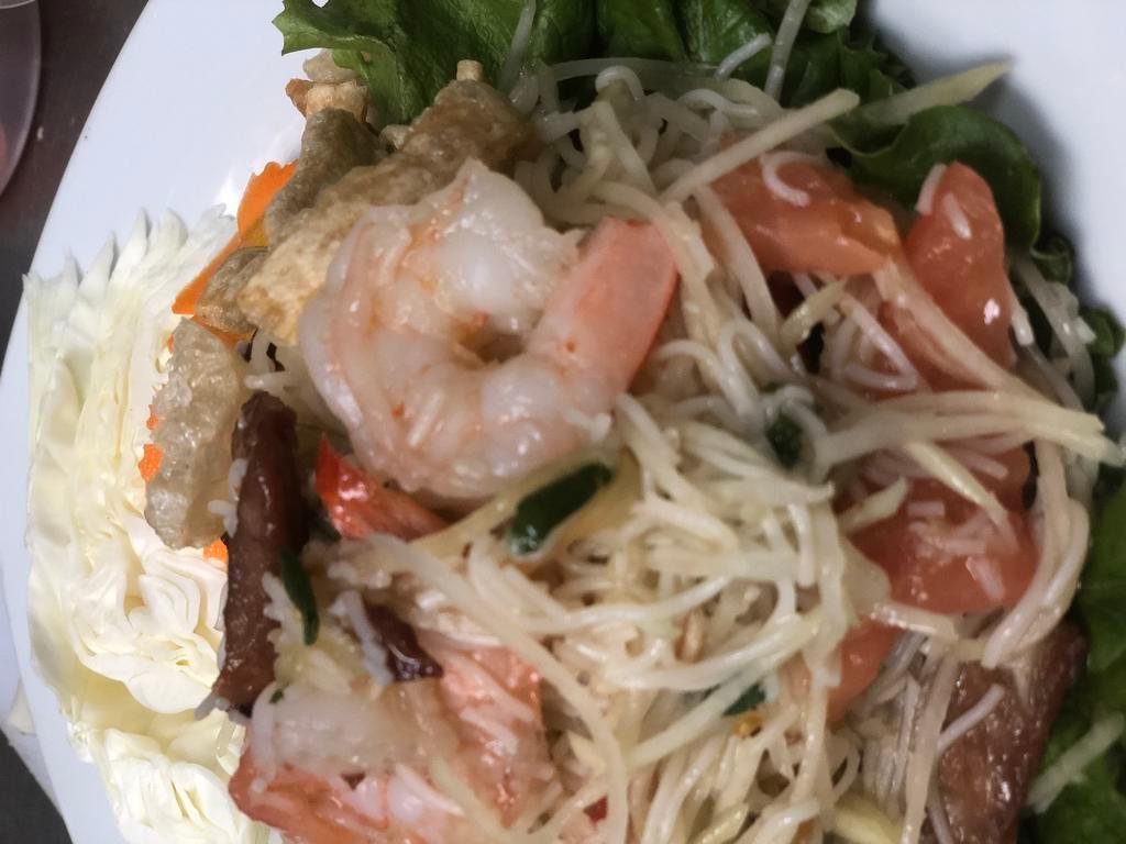 A28. Som Tum Seafood ส้มตำทะเล · Papaya salad mixed with seafood. Spicy.