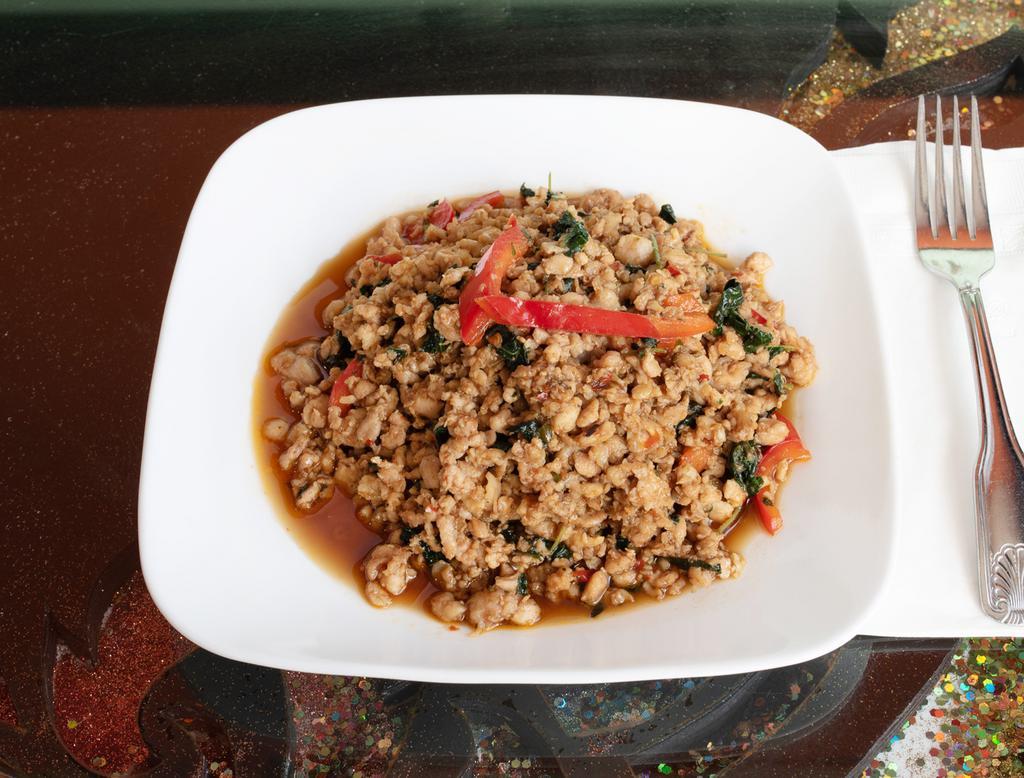 E30. Pad Kra Prao · Sauteed ground meat with garlic and basil. Spicy.