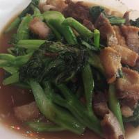 E7. Crispy Pork and Chinese Broccoli ผัดคะน้าหมูกรอบ · Sauteed with oyster sauce with Crispy pork. Spicy.