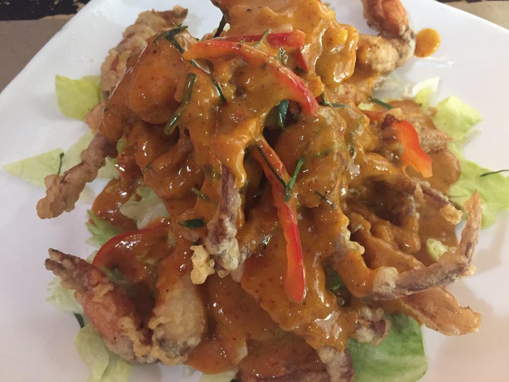 E13. Soft Shell Crab Chu Chee ปูนิ่มฉู่ฉี่ · With coconut milk, lime leaves and curry. Spicy.
