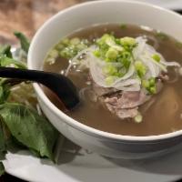 9. Steak & Brisket Pho (Tai Chin) · comes with bean sprouts, and basil.