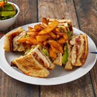 Crepevine Club Sandwich · Chicken breast on sourdough with crispy bacon, avocado, lettuce, tomatoes and mayonnaise. Se...