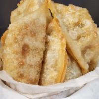 Vegetables Potsticker · Fried dumplings made with round wrappers and stuffed with traditionally pork and cabbage. Ma...