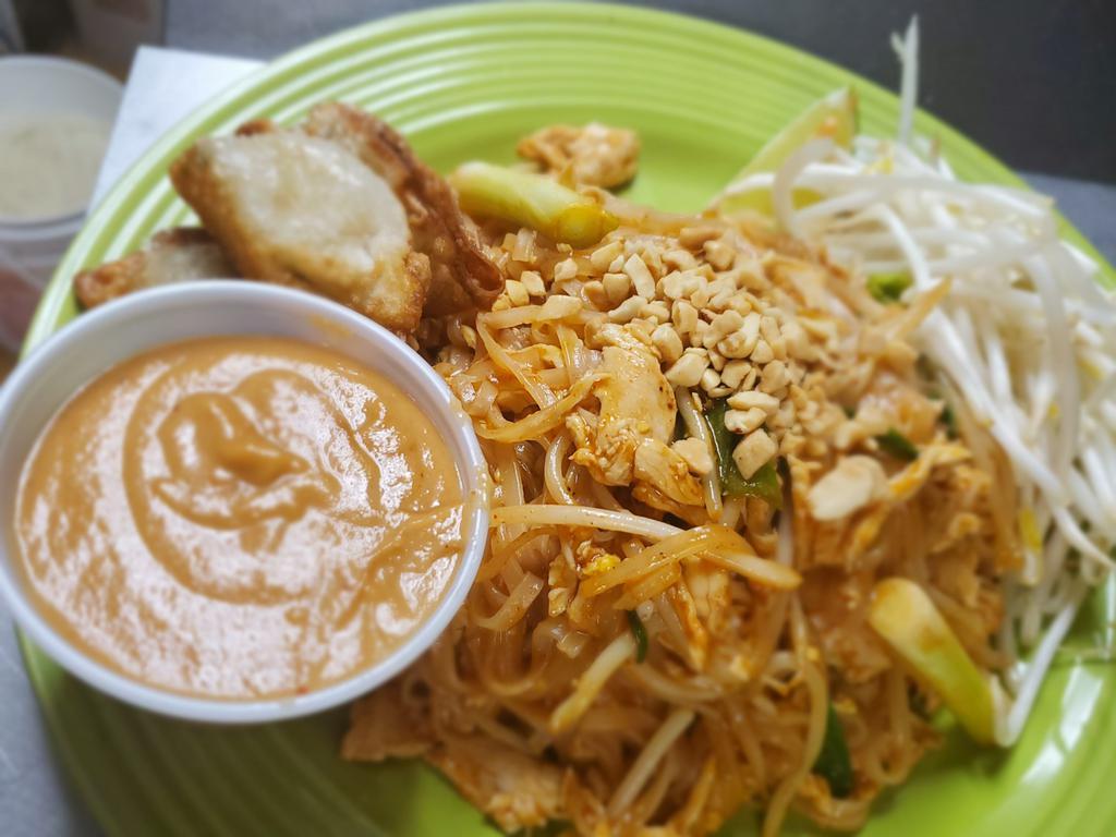 Pad Thai · Rice noodles with your choice of protein, egg, bean sprout, green onion, and cracked peanut, served with peanut sauce.