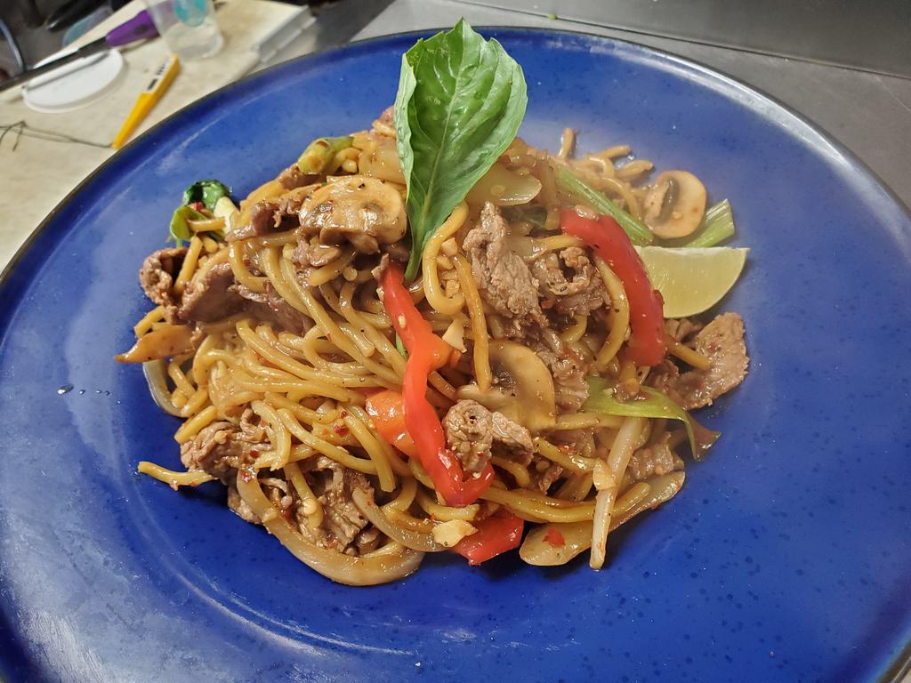 Yakisoba Kee Mao · Yakisoba noodle with your choice of protein, garlic, chili, onion, bell pepper, green onion, Thai basil, and mushroom.