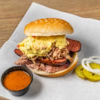 Big Daddy Sandwich · Combination of pulled pork, sausage and brisket topped with potato salad.