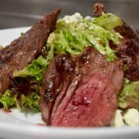 Hanger Bistro Steak Salad · Organic greens, Gorgonzola, grapes, roasted pepper and signature balsamic vinaigrette.