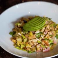 Chopped Cobb Salad · Grilled chicken, smoked ham, bacon, Gorgonzola, sliced egg, avocado and signature balsamic v...
