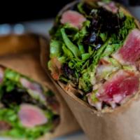 Yellowfin Tuna Wrap · seared rare yellowfin tuna with avocado, red onions, tomato, organic greens and sesame ginge...