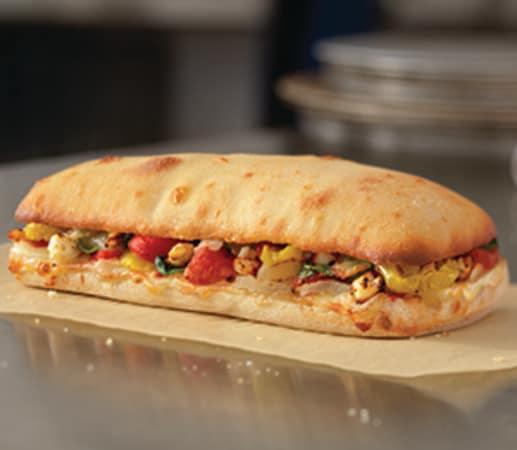 Mediterranean Veggie Sandwich  · Roasted red peppers, banana peppers, diced tomatoes, spinach, onions and feta, provolone and American cheeses. Served on artisan bread and baked to a golden brown. Vegetarian.