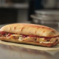 Chicken Parm Sandwich · Grilled chicken breast, tomato basil marinara, Parmesan, asiago and provolone cheese. On art...