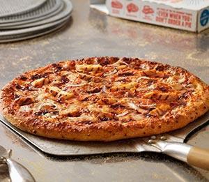 Memphis BBQ Chicken Pizza · Grilled chicken breast, BBQ sauce, fresh onions and 100% real mozzarella, provolone and cheddar on a cheesy cheddar crust.