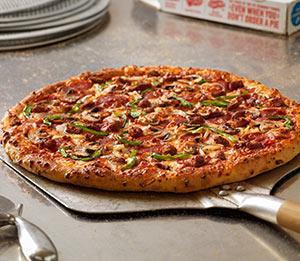 Deluxe Pizza · Topped with pepperoni, Italian sausage, fresh green peppers, fresh mushrooms, fresh onions and cheeses made with mozzarella. 