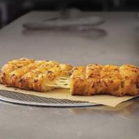 Stuffed Cheesy Bread · Oven-baked bread sticks stuffed with cheese and covered in a blend of cheese made with 100% ...