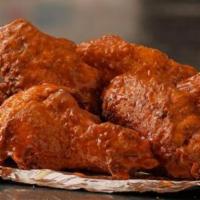 Bone in Wings · Marinated and oven-baked. Available plain or smothered with your choice of hot Buffalo, hone...