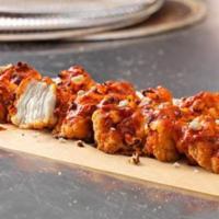 Classic Hot Buffalo Specialty Chicken · Topped with classic hot Buffalo sauce, ranch, a blend of cheese made with mozzarella, chedda...