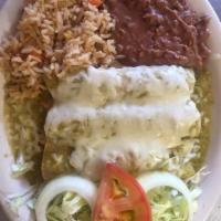 Enchiladas Verde · 3 Enchiladas, Topped with Salsa Verde and Cheese, and Filled with Chicken. Served with Rice,...