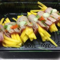 Seared Tuna Mango · Comes with wasabi mayo sauce. May contain uncooked ingredients.