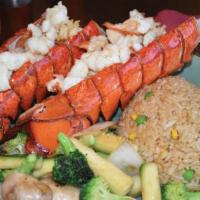 Hibachi twin lobster  · Two Grilled lobster with vegetables, come with fried rice or noodles 