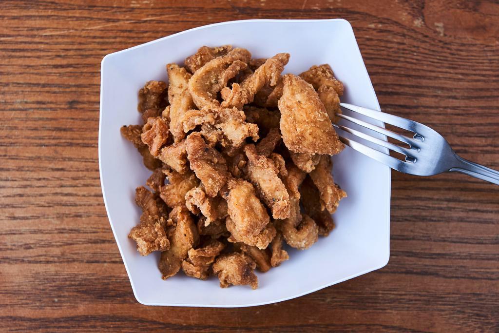 Izzie’s Chicken Bites · Deep fried homemade breaded chicken breast cut into bites. Comes with your choice of bbq or honey mustard sauce.