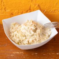 Coleslaw · Shredded raw cabbage and carrots in a mayo base dressing.
