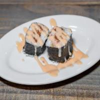 VEGAN SPAMMM MUSUBI - W/ DYNAMITE SAUCE***** wheat and soy allergen · Dynamite drizzle. 1 slice of vegan luncheon meat a.k.a. vegan spamm, wrapped in nori with ri...