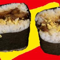 VEGAN TOCINO AND EGG MUSUBI · 1x Vegan soy-based chicken tocino and vegan soy-based eggs in a musubi cut in 2 pieces and d...