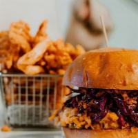 Beer Can Chicken Sandwich · Shredded chicken, cheddar, Carolina gold BBQ, bread and butter pickles, house slaw, crispy f...