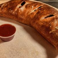 Turnover Stromboly Calzone · Mozzarella blend and pizza sauce.