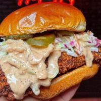 1. Slaw Slider · Chicken tender served in a bun with coleslaw, comeback sauce, and pickles.