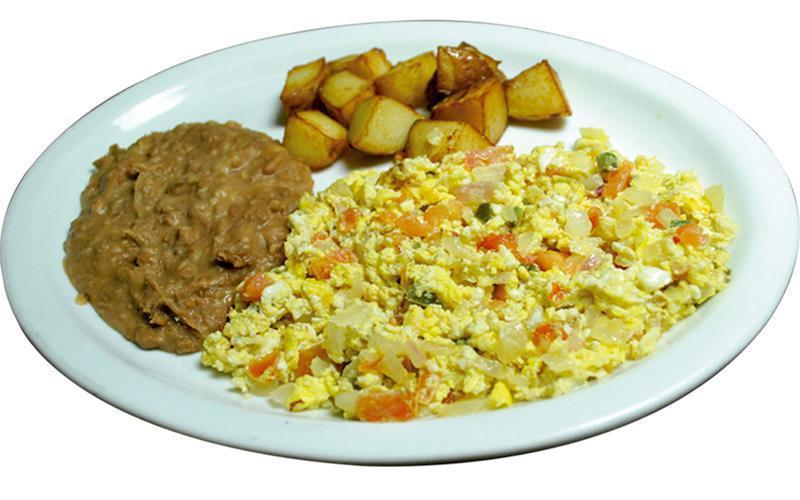 Breakfast Of Your Choice · 2 egg of your choice serve with potatoes, and beans. Tortillas
