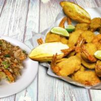 Seafood Family Pack · Paquete familiar. Family pack 6 pieces of fish fillet, 1 lb.of fried shrimp, large rice, and...