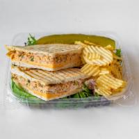 P9. Chicken Fajita Panini · Grilled chicken, cheddar cheese, roasted peppers, caramelized onions and salsa.