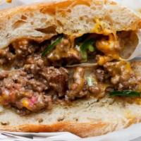 Chopped cheese  · Ground beef, minced onions, bell peppers & melted cheese.