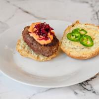 Grass Fed Beef Burger · On House crafted brioche grilled bun. Beef burger, beetroot relish, jalapenos, dressing, sri...