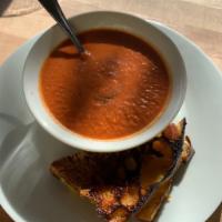 Syracuse Soup with Grilled Cheese on sourdough · Cheddar cheese aged and grilled with sourdough  served with the soup of the day