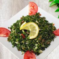 Tabbouleh · Grain wheat, mint, parsley, green onion, tomato, pepper paste, olive oil, lemon juice and sp...