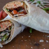 Chicken Kabab Wrap · Garlic, pickles, tomatoes, & Lettuce